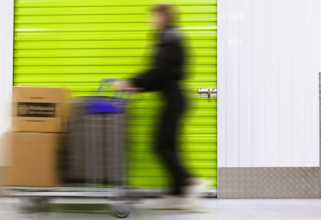 woman in front of self storage unit in milan